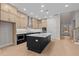 Bright kitchen with a large center island, modern appliances, and ample cabinet storage, perfect for cooking at 4770 Briscoe Dr, Cumming, GA 30028