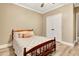 Cozy bedroom with a comfortable bed, neutral walls, and a closet for storage at 798 Mann Rd, Villa Rica, GA 30180