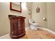 Powder room features a decorative vanity with tile flooring and modern fixtures at 798 Mann Rd, Villa Rica, GA 30180