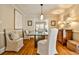 Bright dining room with hardwood floors and unique glass table at 807 Longwood Dr, Atlanta, GA 30305