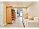 Hallway with wood-look floors that leads to a cozy living room at 807 Longwood Dr, Atlanta, GA 30305