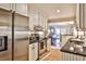 Modern kitchen with stainless steel appliances, granite countertops and lots of light at 807 Longwood Dr, Atlanta, GA 30305