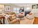 Inviting living room with fireplace, built-in shelving, neutral palette, and comfortable seating at 807 Longwood Dr, Atlanta, GA 30305