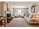 Elegant living room features a fireplace, hardwood floors, and bright natural light at 807 Longwood Dr, Atlanta, GA 30305