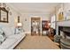 Cozy living room with hardwood floors, fireplace, and lots of natural light at 807 Longwood Dr, Atlanta, GA 30305