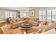 Large living room with fireplace, plantation shutters, and ample seating space at 807 Longwood Dr, Atlanta, GA 30305