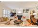 Cozy living room with fireplace, built-ins, plantation shutters, and warm, inviting decor at 807 Longwood Dr, Atlanta, GA 30305