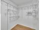 Spacious walk-in closet with custom shelving and ample storage space for an organized wardrobe at 1040 Millridge Se Ln, Marietta, GA 30067