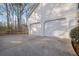 Two-car garage provides secure parking and additional storage space at 1040 Millridge Se Ln, Marietta, GA 30067