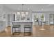 Modern kitchen with island seating and stainless steel appliances at 1040 Millridge Se Ln, Marietta, GA 30067