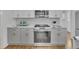 Modern kitchen with stainless steel appliances and granite countertops at 1040 Millridge Se Ln, Marietta, GA 30067