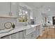 Bright kitchen with stainless steel appliances and a farmhouse sink at 1040 Millridge Se Ln, Marietta, GA 30067