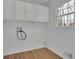 Laundry room featuring overhead cabinets and natural light at 1040 Millridge Se Ln, Marietta, GA 30067