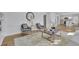 Open-concept design: living room flows into a bright, modern kitchen at 1040 Millridge Se Ln, Marietta, GA 30067