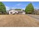 Charming single-story home featuring red shutters, a covered porch, and an attached one-car garage at 2685 Archer Way, Dacula, GA 30019