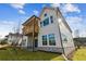 Beautiful new home with a charming balcony, stone accents, and a well-maintained lawn at 4480 Beechnut Cir, Cumming, GA 30028