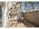 Outdoor patio featuring a metal bistro set and privacy fence ideal for relaxation and entertaining at 29 Ivy Ne Trl, Atlanta, GA 30342