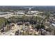 Aerial neighborhood view showcasing well-maintained homes, green spaces, and tree-lined streets at 832 Forest Path Ln, Alpharetta, GA 30022