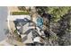 Aerial view of the house showing the pool, patio, and surrounding landscape at 832 Forest Path Ln, Alpharetta, GA 30022