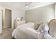 Cozy bedroom with natural light, neutral walls, and stylish decorations on the dresser at 832 Forest Path Ln, Alpharetta, GA 30022