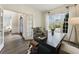 Stylish home office with hardwood floors, natural light, and a tranquil work environment at 832 Forest Path Ln, Alpharetta, GA 30022
