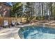 Backyard pool area with lounge chairs at 832 Forest Path Ln, Alpharetta, GA 30022