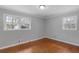 Bedroom featuring hardwood floors, neutral paint, and natural light at 1385 Lucky Sw Ln, Mableton, GA 30126