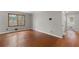 A versatile living space featuring hardwood floors and a sunlit window at 1385 Lucky Sw Ln, Mableton, GA 30126