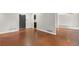 Open floor plan with hardwood floors flowing into the living room and kitchen at 1385 Lucky Sw Ln, Mableton, GA 30126
