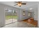 Bright living room with sliding glass doors leading to the backyard at 1385 Lucky Sw Ln, Mableton, GA 30126