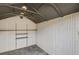The shed interior has installed shelving with durable panelling on the walls at 1385 Lucky Sw Ln, Mableton, GA 30126