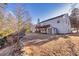 Expansive backyard with a covered patio, shed, and ample space for recreation at 2010 Skylar Leigh Dr, Buford, GA 30518
