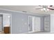 Bedroom with soft carpeting, recessed lighting, built-in shelving, and easy access to the ensuite bath at 2010 Skylar Leigh Dr, Buford, GA 30518