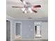 Bright bedroom with an illuminated ceiling fan and doorways to other rooms at 2010 Skylar Leigh Dr, Buford, GA 30518
