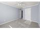 Cozy bedroom features soft carpeting, fresh paint, and a window to allow natural light at 2010 Skylar Leigh Dr, Buford, GA 30518