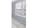 Bright bedroom with neutral walls, carpet flooring, and large windows with blinds at 2010 Skylar Leigh Dr, Buford, GA 30518