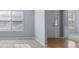 Bright living room features hardwood and carpet floors and neutral walls at 2010 Skylar Leigh Dr, Buford, GA 30518
