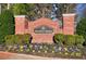 An attractive Providence Crossing brick sign with beautiful landscaping in front of the community at 2010 Skylar Leigh Dr, Buford, GA 30518