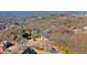 Elevated perspective showcasing a home within a community, revealing its expansive yard and mature trees at 2949 Summitop Ne Ct, Marietta, GA 30066