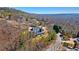 Stunning aerial view of a home nestled in the mountains with panoramic views of the valley at 2949 Summitop Ne Ct, Marietta, GA 30066