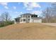 Elegant two-story home boasts a spacious driveway and attached garage, set on a beautiful lot at 2949 Summitop Ne Ct, Marietta, GA 30066