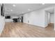 Open concept basement featuring recessed lighting, stainless steel appliances, and a large island with bar seating at 2949 Summitop Ne Ct, Marietta, GA 30066