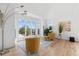 Bright living room featuring hardwood floors, a cozy seating area with a bay window, and elegant decor at 2949 Summitop Ne Ct, Marietta, GA 30066