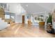 Open-concept living space with high ceilings, hardwood floors, inviting seating, and picturesque windows at 2949 Summitop Ne Ct, Marietta, GA 30066