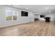 Open concept basement featuring recessed lighting, stainless steel appliances, and exterior view at 2949 Summitop Ne Ct, Marietta, GA 30066