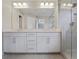 Modern bathroom featuring a double vanity, sleek fixtures, and a glass-enclosed shower at 3533 Koyla Lndg # 5, Chamblee, GA 30341