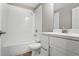 A modern bathroom featuring a white vanity, a toilet, and a shower with white tile surround at 3533 Koyla Lndg # 5, Chamblee, GA 30341