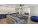 Open basement area includes a cozy seating area and entertainment bar at 4815 Westgate Dr, Cumming, GA 30040