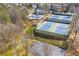 Aerial view of a community featuring a pool, tennis courts, and a basketball court for recreation at 4815 Westgate Dr, Cumming, GA 30040