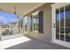 Inviting covered porch featuring classic design and charming light fixtures at 4815 Westgate Dr, Cumming, GA 30040